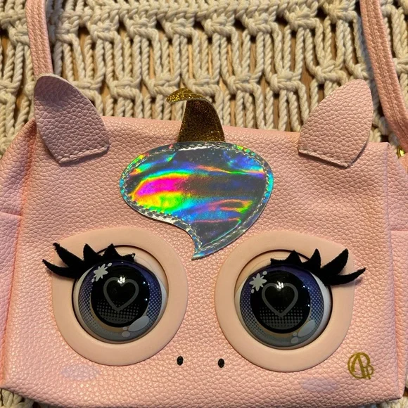 Light pink pleather unicorn purse (switch inside that makes eyes open & close) - Picture 2 of 5